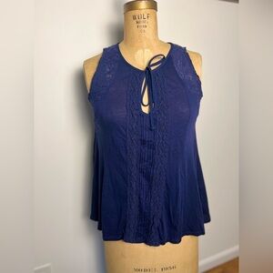 Anthropologie Meadow Rue royal
Blue knit sleeveless top with lace size small